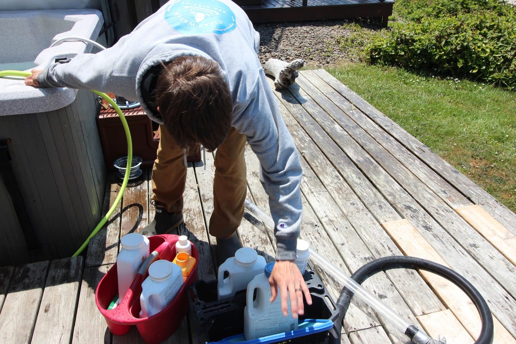 Chemicals and equipment staged for a drain and fill